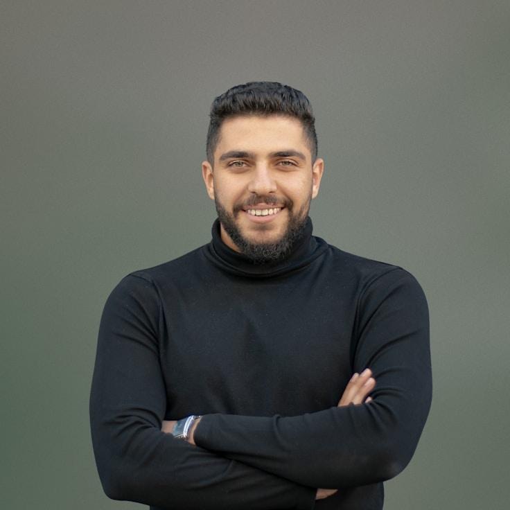 Kaveri Mehta, Lead Design Curator at TimberMarinerCipher, reviewing corporate floral arrangements